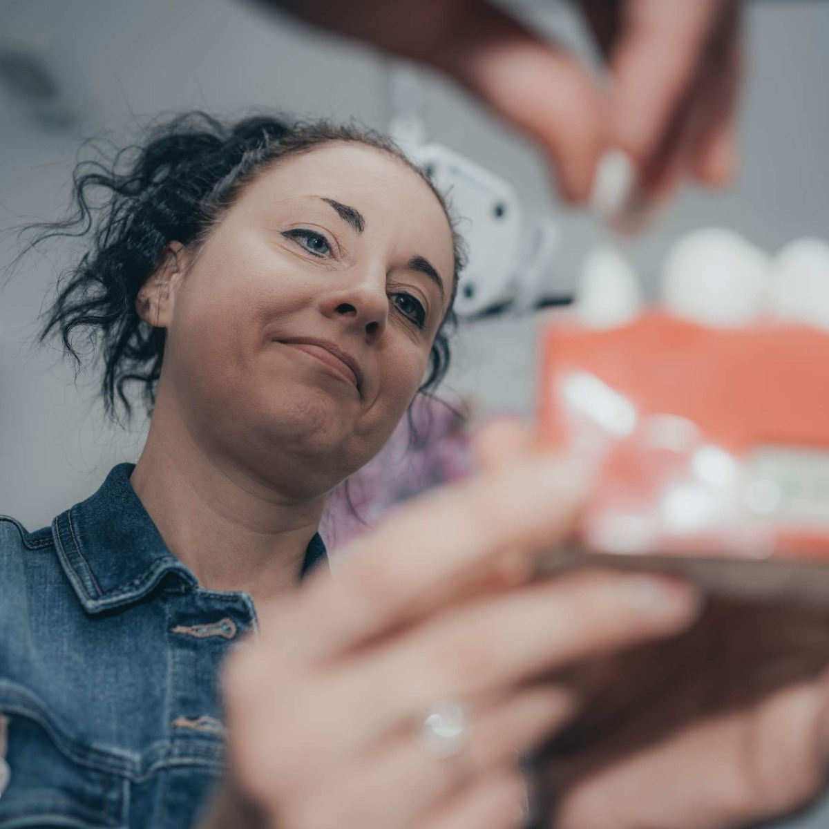 Dental implant model shown to a patient in Northwich